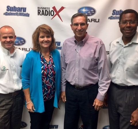 SIMON SAYS, LET S TALK BUSINESS: Scott Deaton with Dataforensics, Nancy McGill with Cartridge World Lawrenceville, and Andy Morgan with the