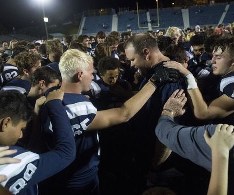 Gameday I.Q.:Can a High School Football Coach participate in a post game student athlete led prayer?