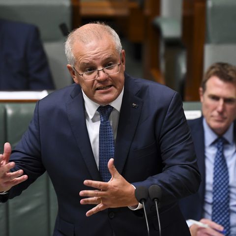 Morrison plays pandemic politics on borders, hitting back at Virgin CEO's call for restrictions to ease
